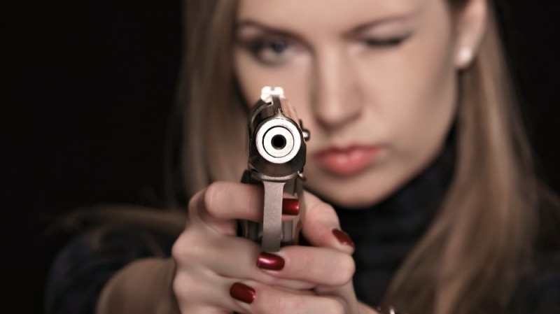 Create meme: a girl shoots a gun, girl with a gun, shooting a gun