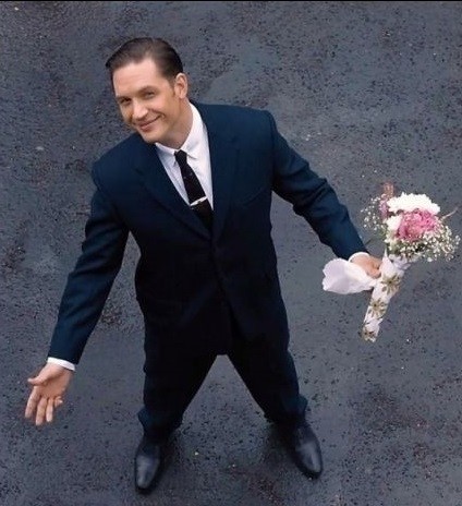 Create meme: Tom hardy is a legend, the legend movie with tom hardy flowers, tom hardy with flowers