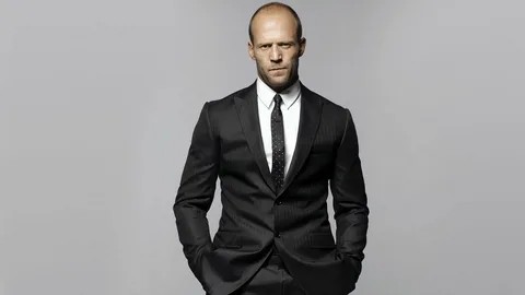 Create meme: Jason Statham bald, meme Jason Statham, Statham in a suit