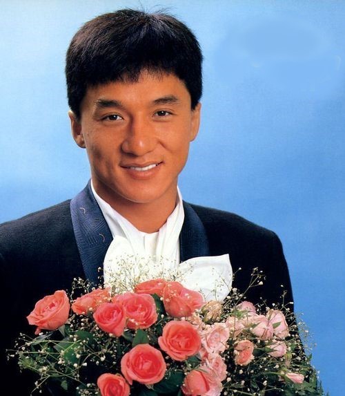 Create meme: meme Jackie Chan , young jackie Chan, jackie Chan with flowers