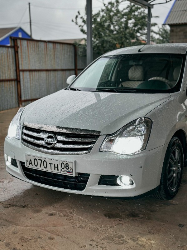 Создать мем: Nissan Almera Classic, белый ниссан альмера, nissan almera 2014