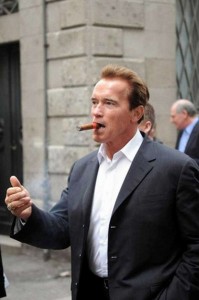 Create meme: sad Arnold Schwarzenegger, Smoking Arnold Schwarzenegger, Schwarzenegger with a cigar