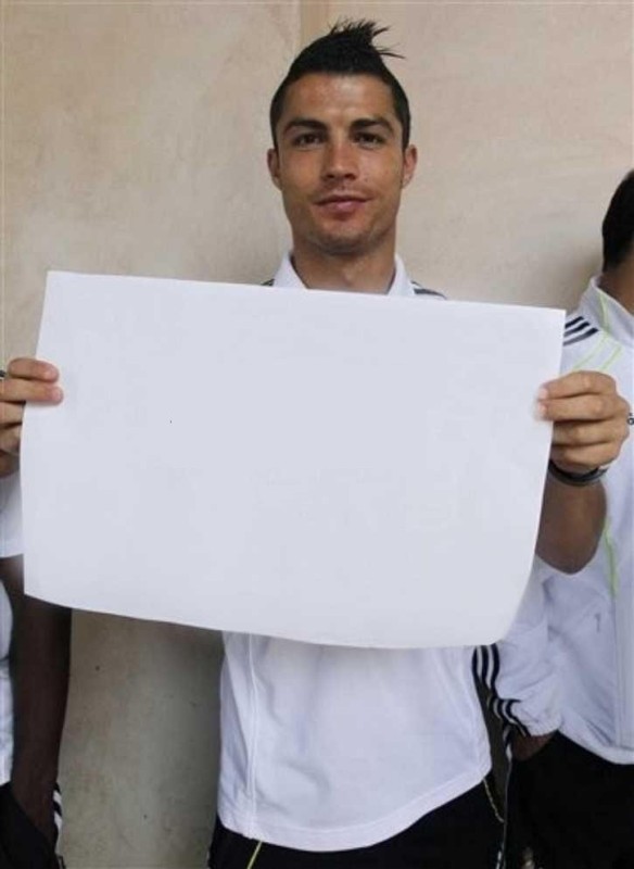 Create meme: ronaldo with a piece of paper template, Cristiano Ronaldo holds a piece of paper, ronaldo with a sign