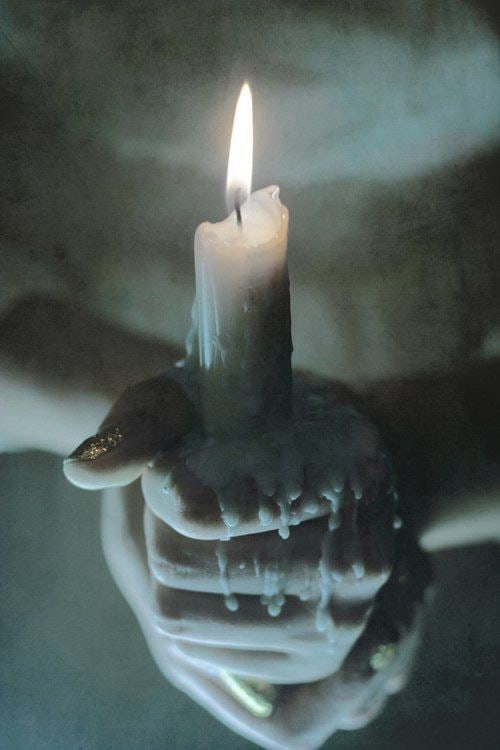 Create meme: candle in hand, candle magic, aesthetics of candles