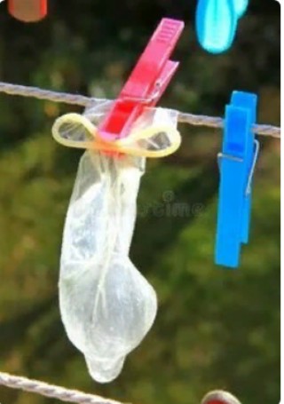 Create meme: used condoms, condoms on a string, condoms are drying on a rope