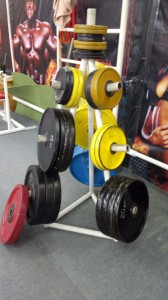 Create meme: rack for barbells, gym, rod and sporting a pear in the Park