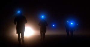 Create meme: a man with a flashlight in the dark, the fog at night, a man shines a flashlight