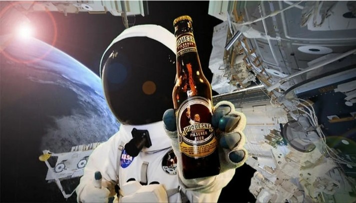 Create meme: astronaut in space, cosmonaut carlsberg, beer in space