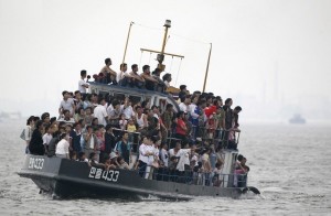 Create meme: photo of refugees in Europe 2015 into the sea, boat river Korea, tourism