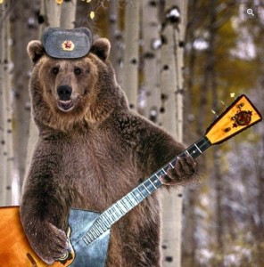Create meme: stuffed bear with a balalaika, bear with balalaika photo, bear in a cap with ear-flaps with a balalaika