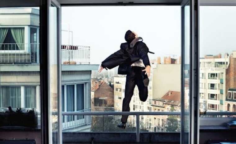 Create meme: jumping out of the window, jumped out of the window, A man jumps out of a window