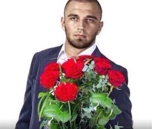 Create meme: holding a bouquet, bouquet to the man, a man with flowers in his hands