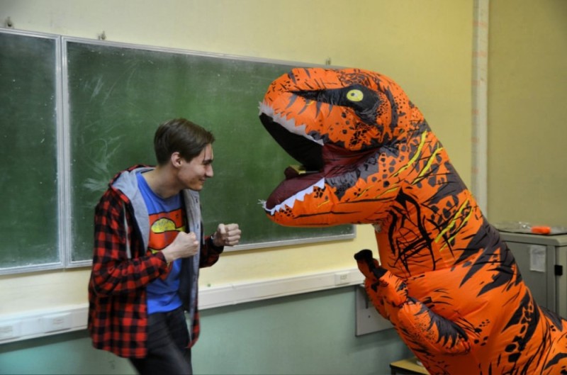 Create meme: people , chalk Board, dinosaur costume for children