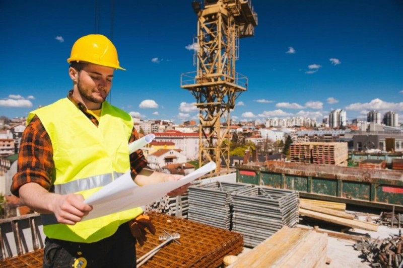 Create meme: photostock builder, workers at the construction site, construction 