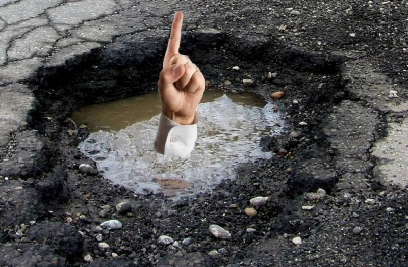 Create meme: a hole in the asphalt, fresh asphalt, shoes 