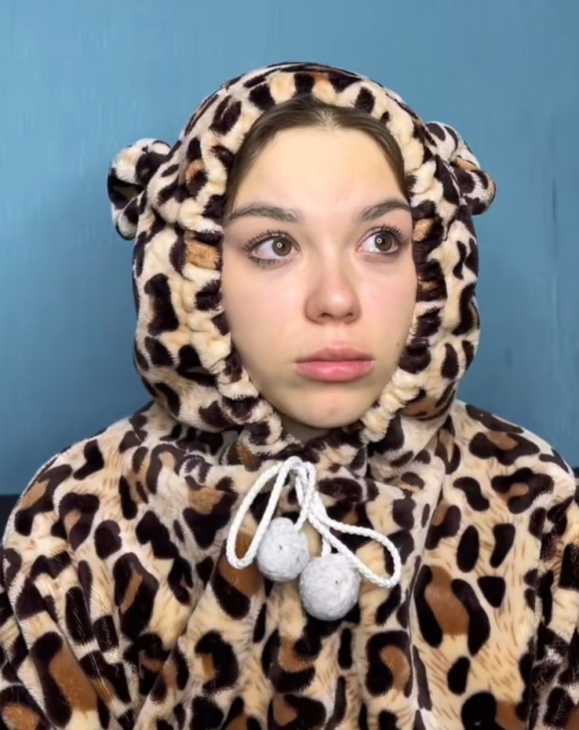 Create meme: girl , hat scarf with ears bear, Kigurumi the cheetah