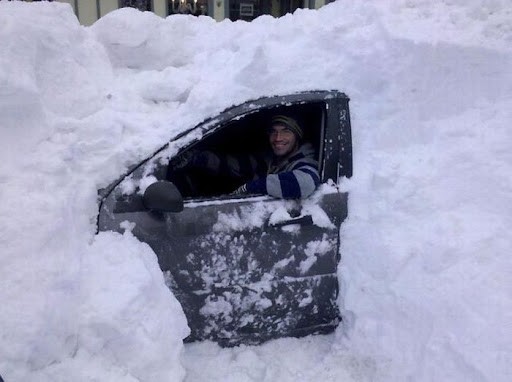 Create meme: a car in the snow, There is a lot of snow, the car is covered with snow