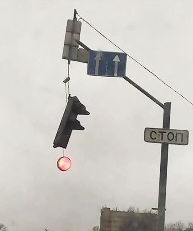Create meme: traffic light , the traffic light is hanging, I'm holding on to the traffic light