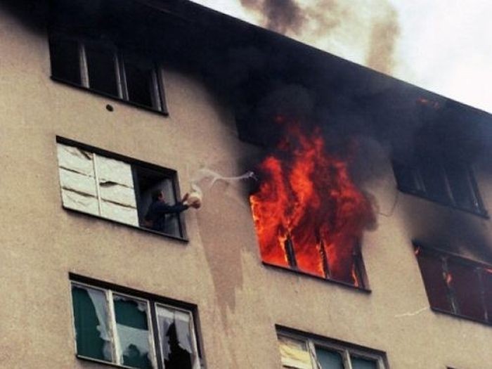 Create meme: people, the house is on fire, a fire in an apartment building