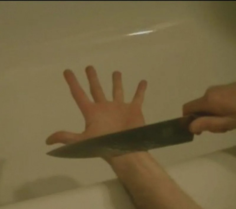 Create meme: body part, knife, a knife in two hands