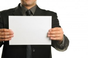 Create meme: stock photos, a man with a sheet of paper, man holds a sign