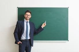 Create meme: teacher man, a man near the board, The male teacher is near the blackboard