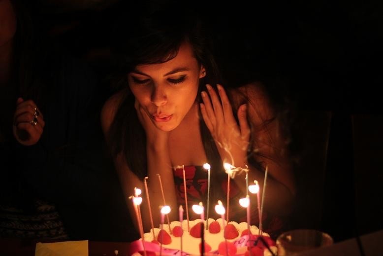 Create meme: blowing out the candles on the cake, blowing out candles on a cake, blows out the candles