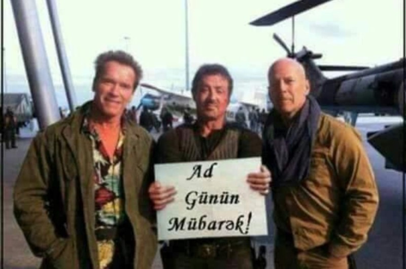 Create meme: schwarzenegger stallone bruce willis happy birthday, Bruce willis, Stallone Schwarzenegger Willis with a sign