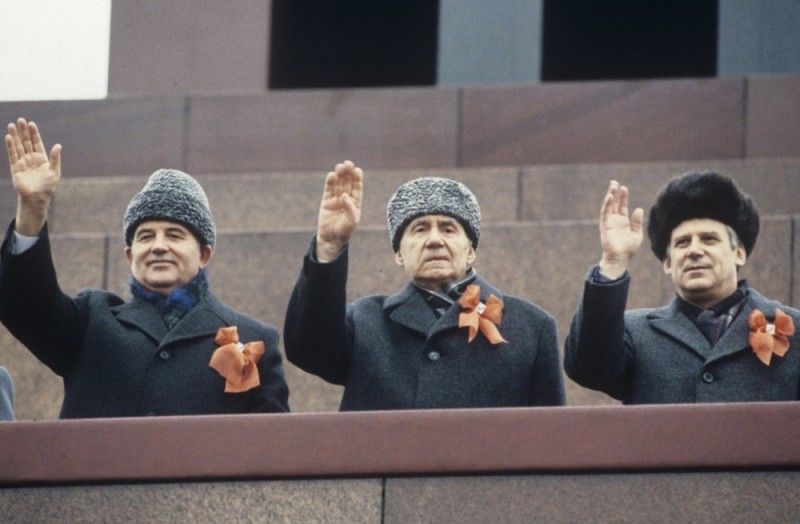 Create meme: mikhail sergeyevich gorbachev, Mikhail Gorbachev on the podium of the mausoleum, Brezhnev in a astrakhan hat