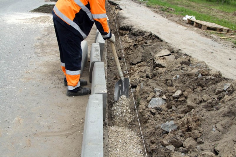 Create meme: laying of the curb stone, road curbs, concreting the curb