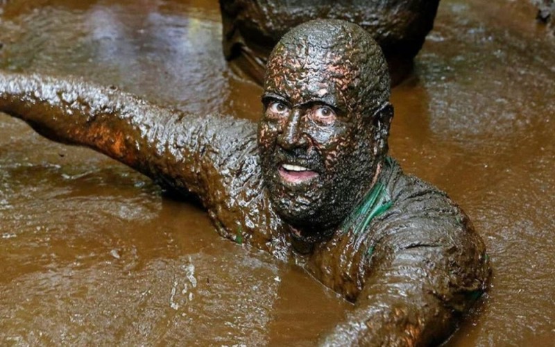 Create meme: the man in the mud, face in the mud , covered in mud