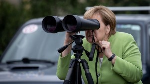 Create meme: binoculars, Merkel looks through binoculars, Merkel binoculars