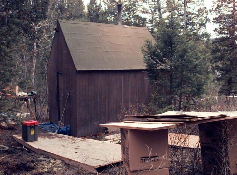 Create meme: The unabomber hut, theodore Kaczynski, a house in the forest
