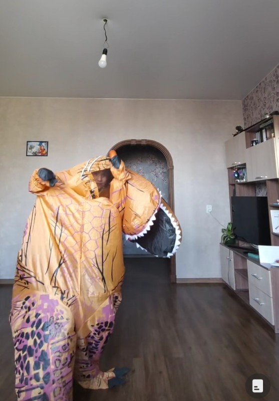 Create meme: dinosaur costume, furniture , people 