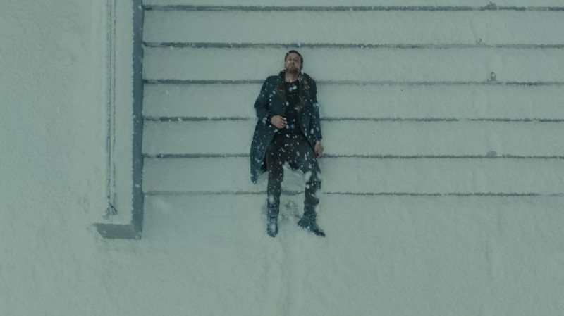 Create meme: Blade Runner 2049 Ryan Gosling on the steps, Ryan Gosling lies in the snow, ryan gosling blade runner