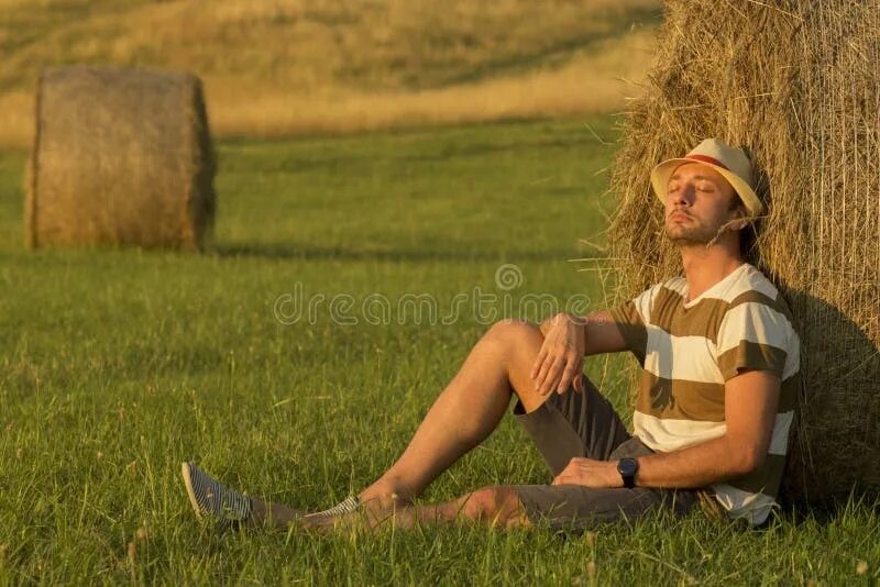 Create meme: the man in the field, male , photo shoot in a hay field