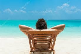 Create meme: chaise longue on the sea, vacation by the sea, A man is lying on a chaise longue