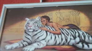 Create meme: tiger, embroidery girl with tiger embroidery, the picture of the virgin with a white tiger