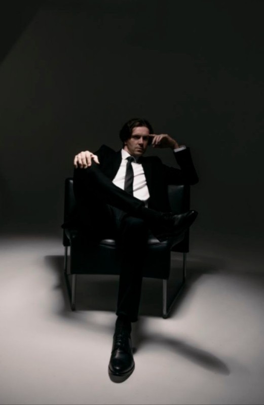 Create meme: the man in the chair, a man is sitting in a chair, men