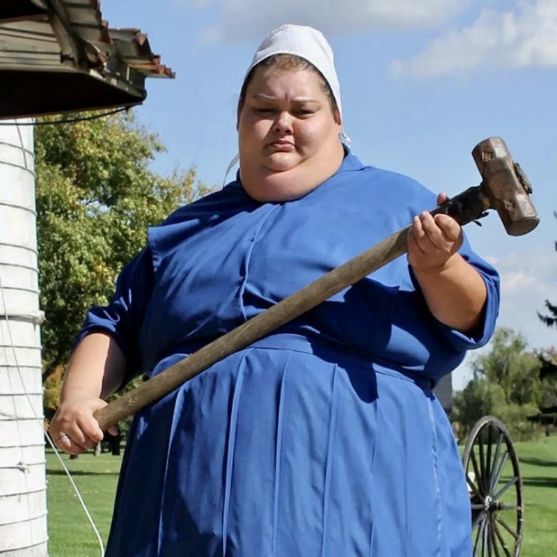 Create meme: a woman with a sledgehammer, the woman is fat, fat woman