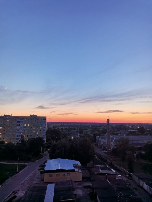 Create meme: beautiful sky , furniture , sunset over city