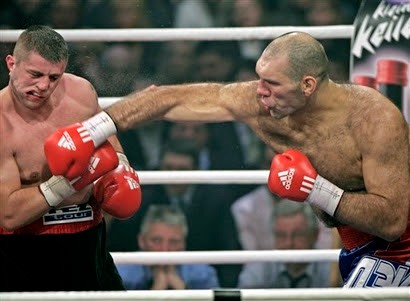 Create meme: nikolay valuev boxing, Nikolay Valuev in the ring, Nikolai Valuev boxer