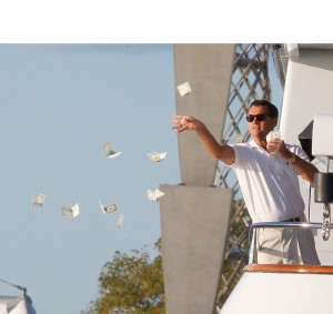 Create meme: Leonardo DiCaprio the wolf of wall street, DiCaprio throws money, Leonardo DiCaprio throws money