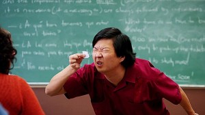 Create meme: meme Chinese with a piece of paper, the Chinese man looks at a piece of paper, Chinese squints