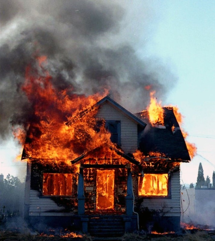 Create meme: burning house , the house is on fire, burning wooden house