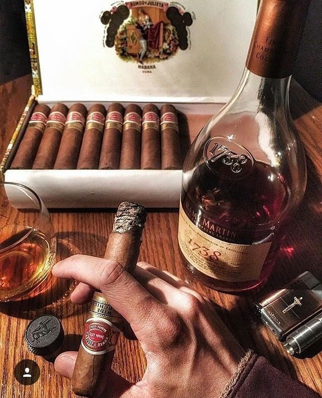 Create meme: cognac and cigar, cigars, cigar cigar