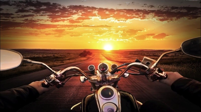 Create meme: motorcycle sunset, motorcycle road, motorcycle from the first person
