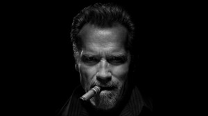 Create meme: celebrities with a cigar, Arnold with a cigar, photos of celebrities with a cigar