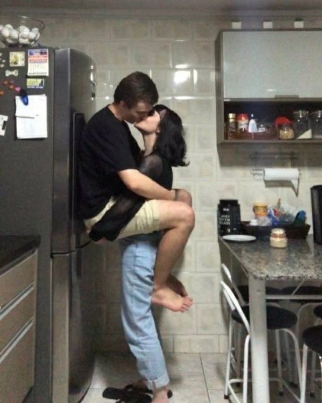 Create meme: lovers in the kitchen, passion in the kitchen, couple's photo shoot in the kitchen