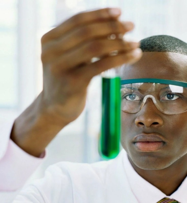 Create meme: a negro with a test tube, chemist , people